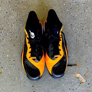 Black and yellow Adidas basketball shoes!